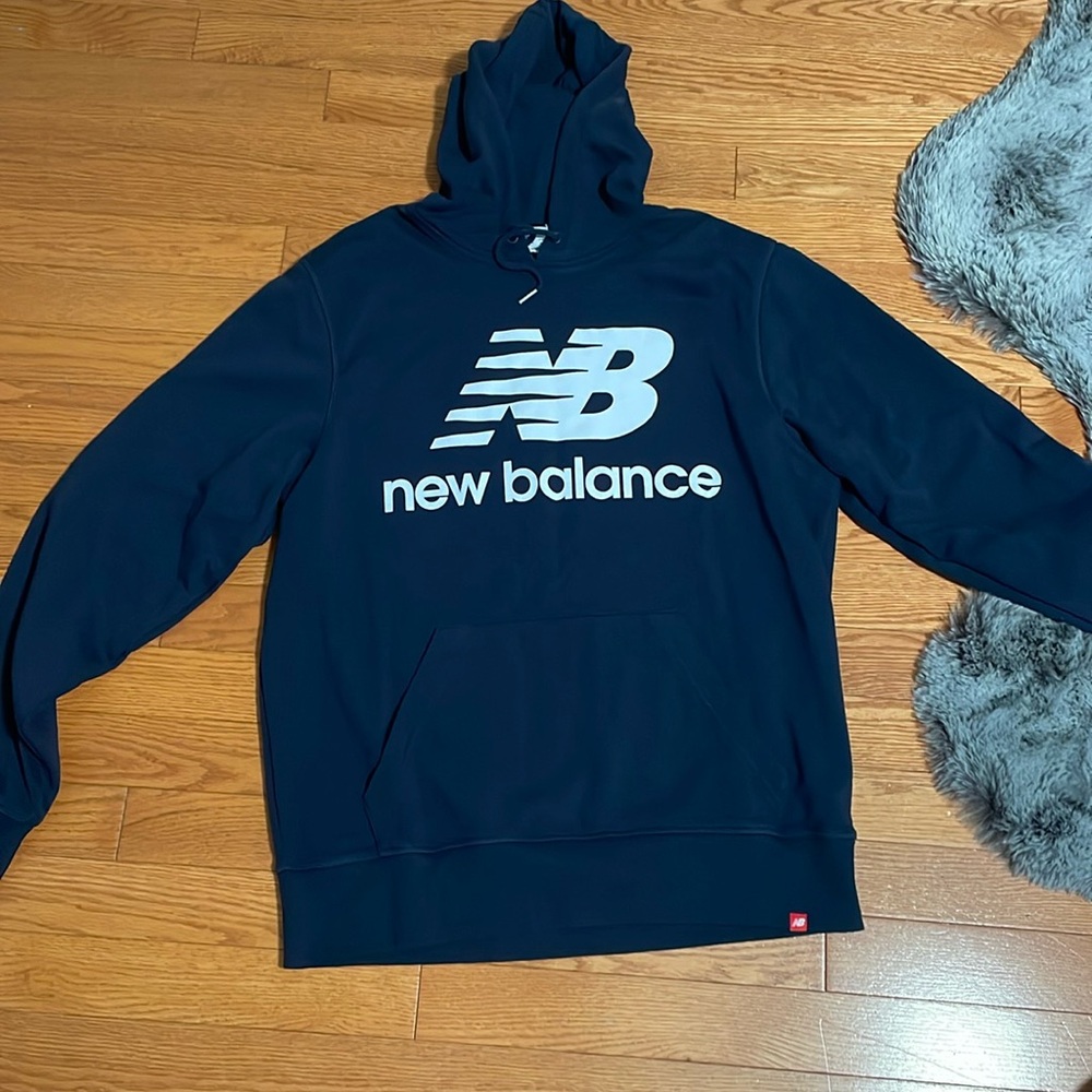 Navy blue New Balance hoodie. Never worn.